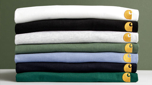 A stack of Carhartt WIP Chase T-Shirts at Urban Industry