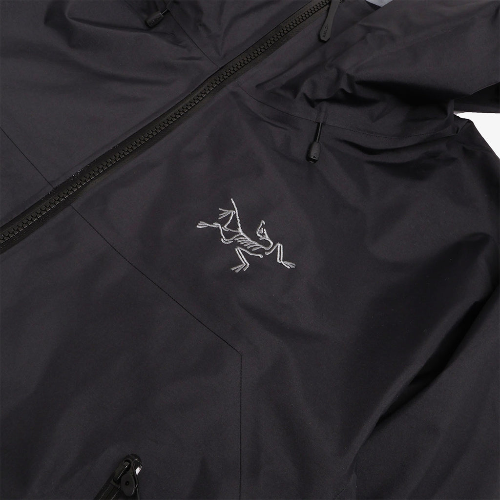 Embroidered Arc'teryx bird logo and front zip detail