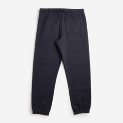 thumbnail Carhartt WIP Chase Sweat Pant, Dark Navy Gold, Detail Shot 3