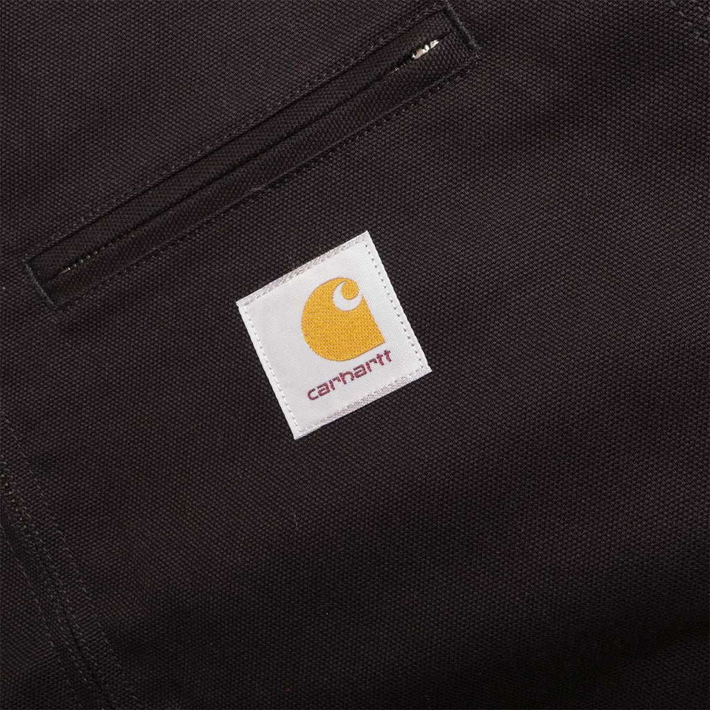 Carhartt WIP square label on the black canvas chest pocket