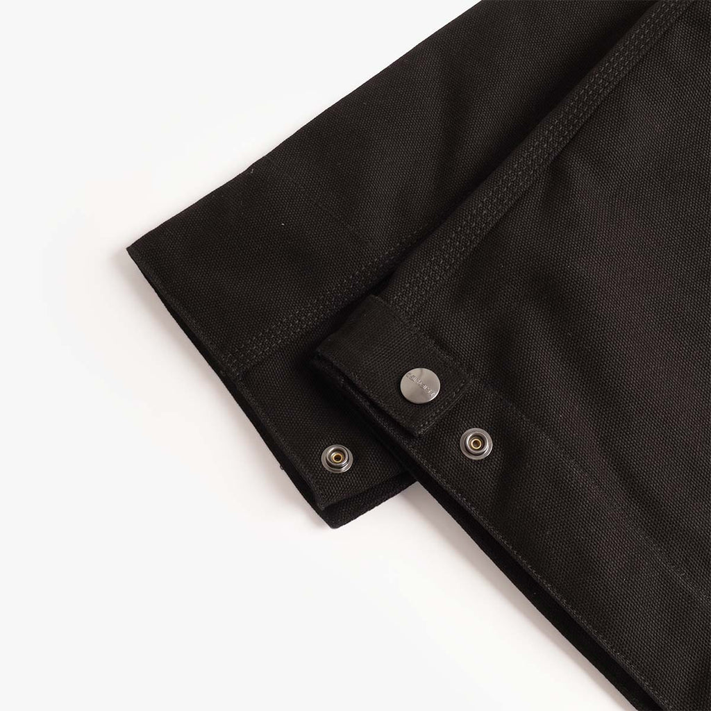 Snap cuff detail on the black Carhartt WIP Detroit jacket