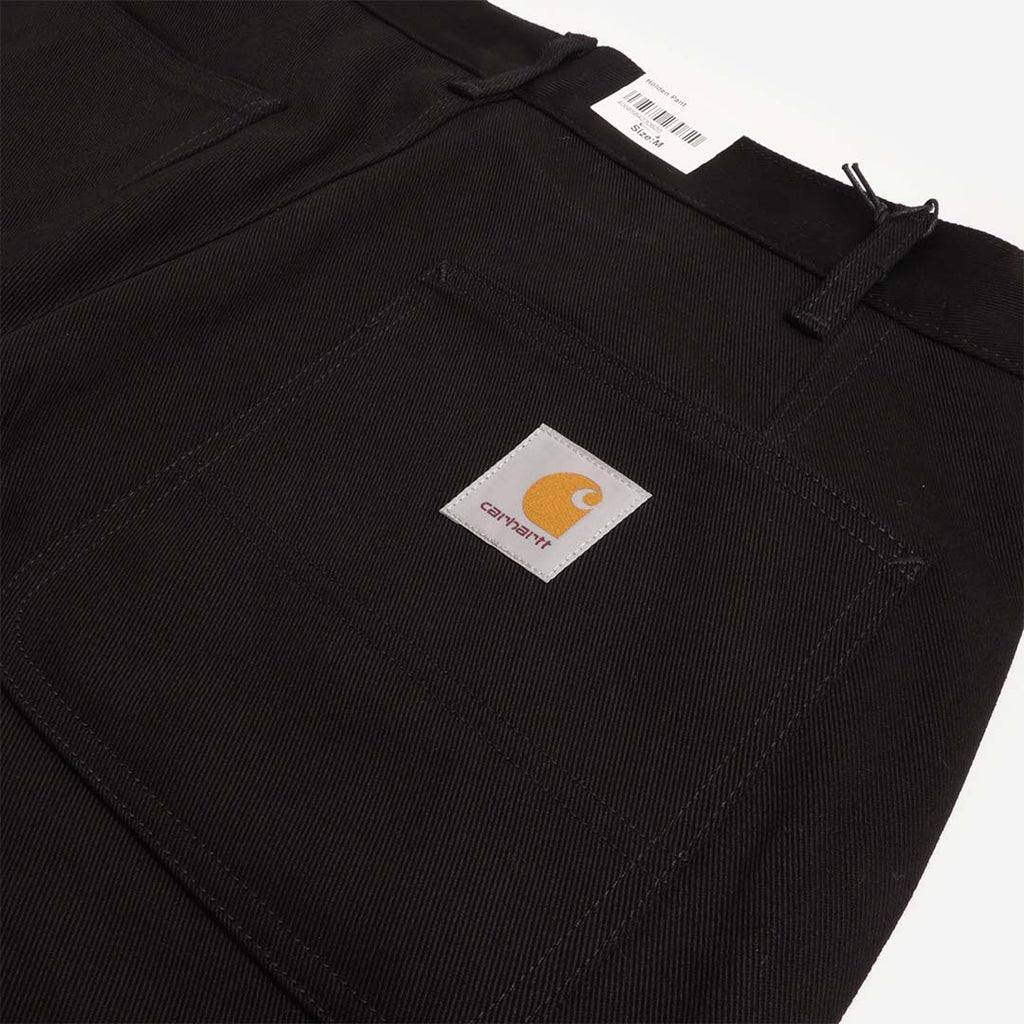 Carhartt WIP label on black patch pocket