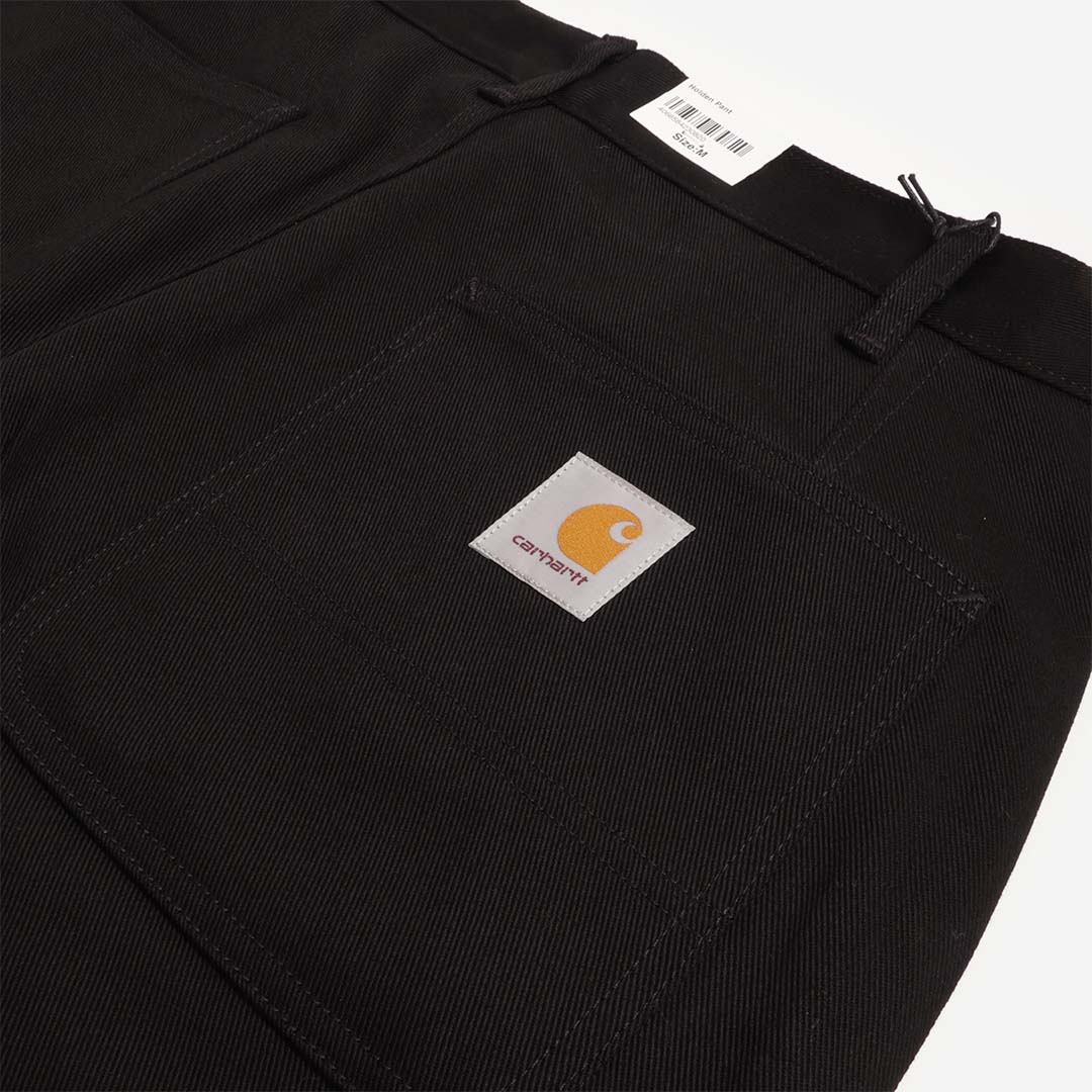 Carhartt WIP label on black patch pocket