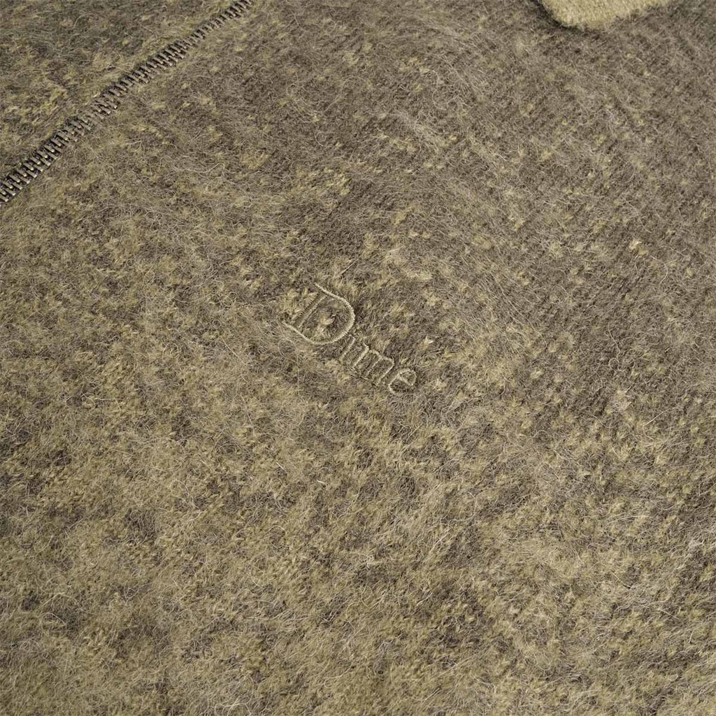 Embossed Dime logo on forest green mohair knit