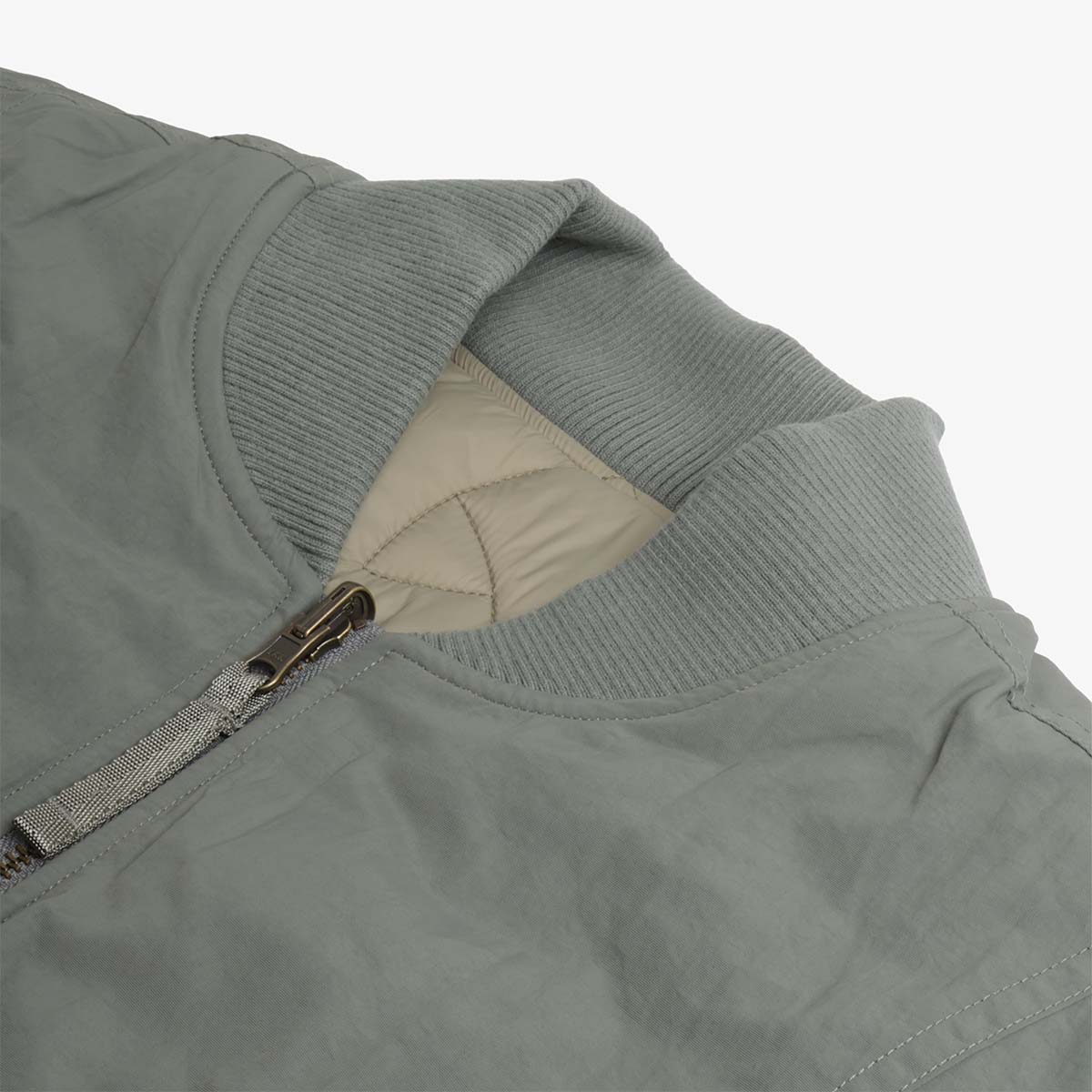 Ribbed collar and zip pull, Dime Reversible vest