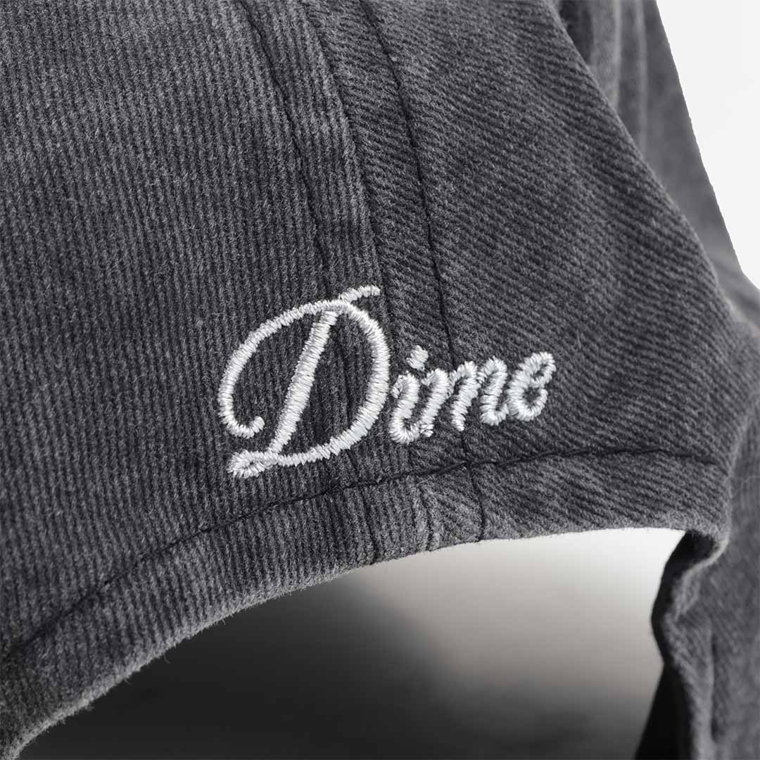 Dime script embroidery on washed black cap side