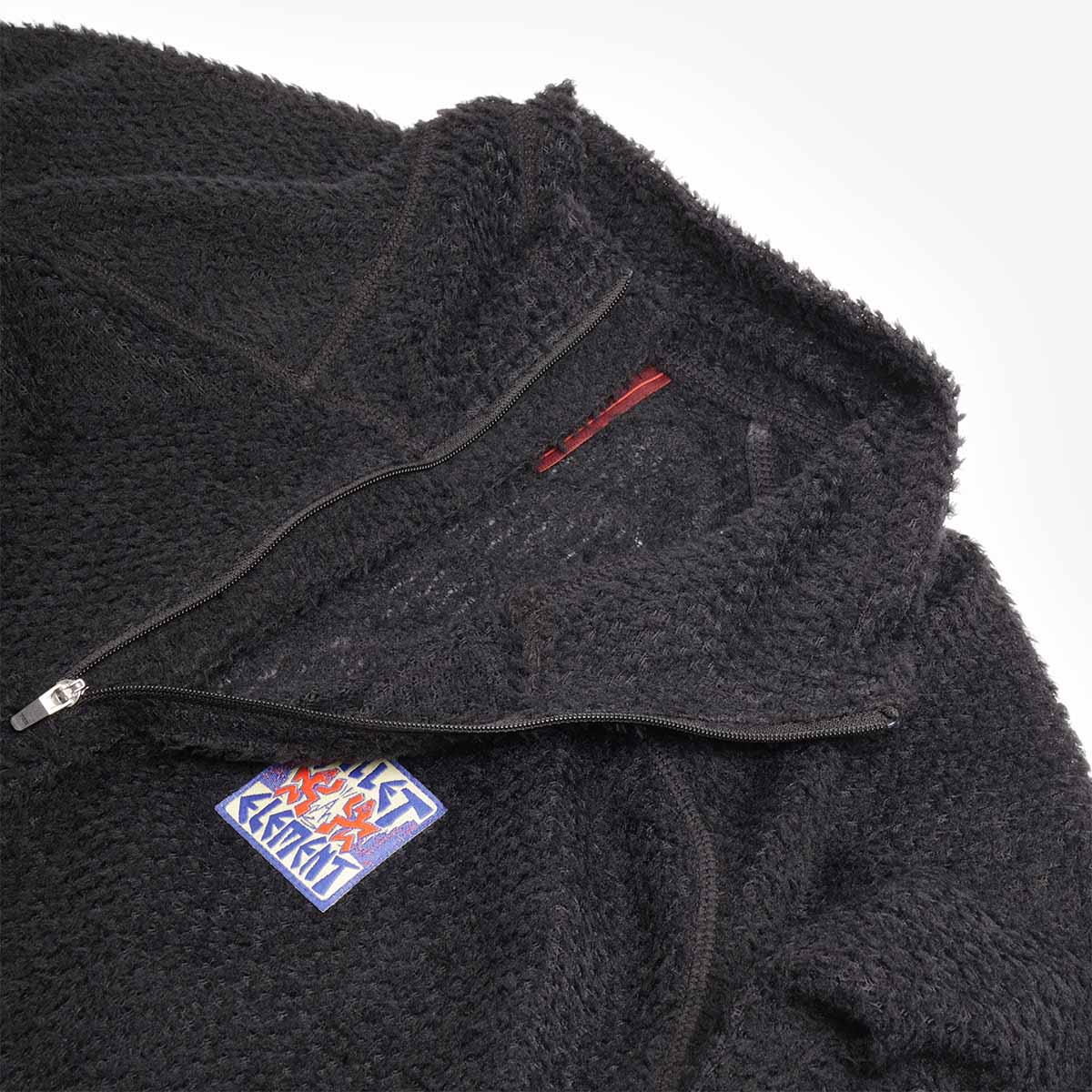 Quarter zip, collar and chest patch, black fleece