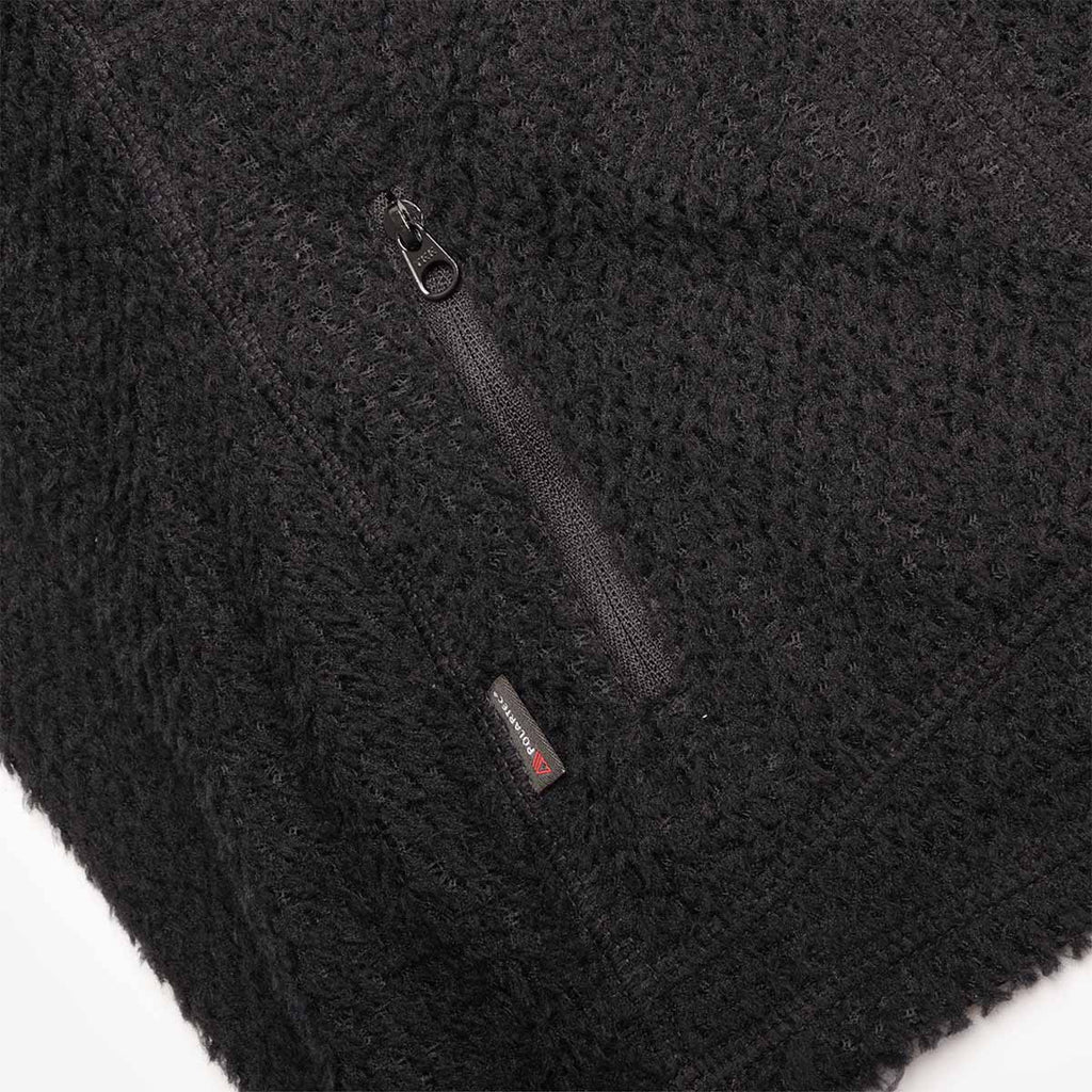 Hem and zip pocket detail, black fleece