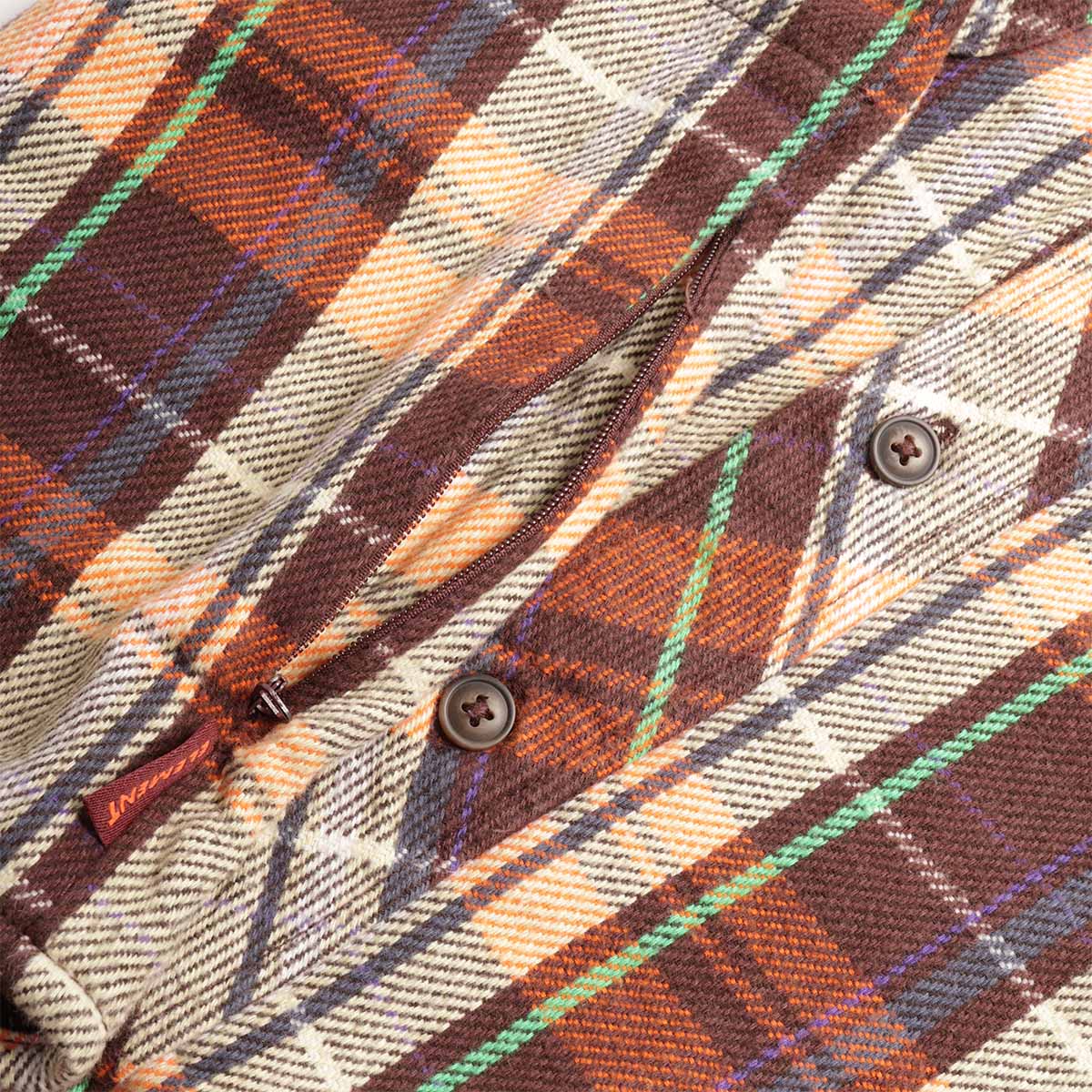 Chest pocket and button placket, rust check flannel