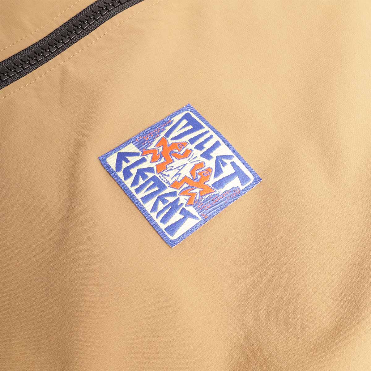 Millet x Element woven chest patch on copper panel