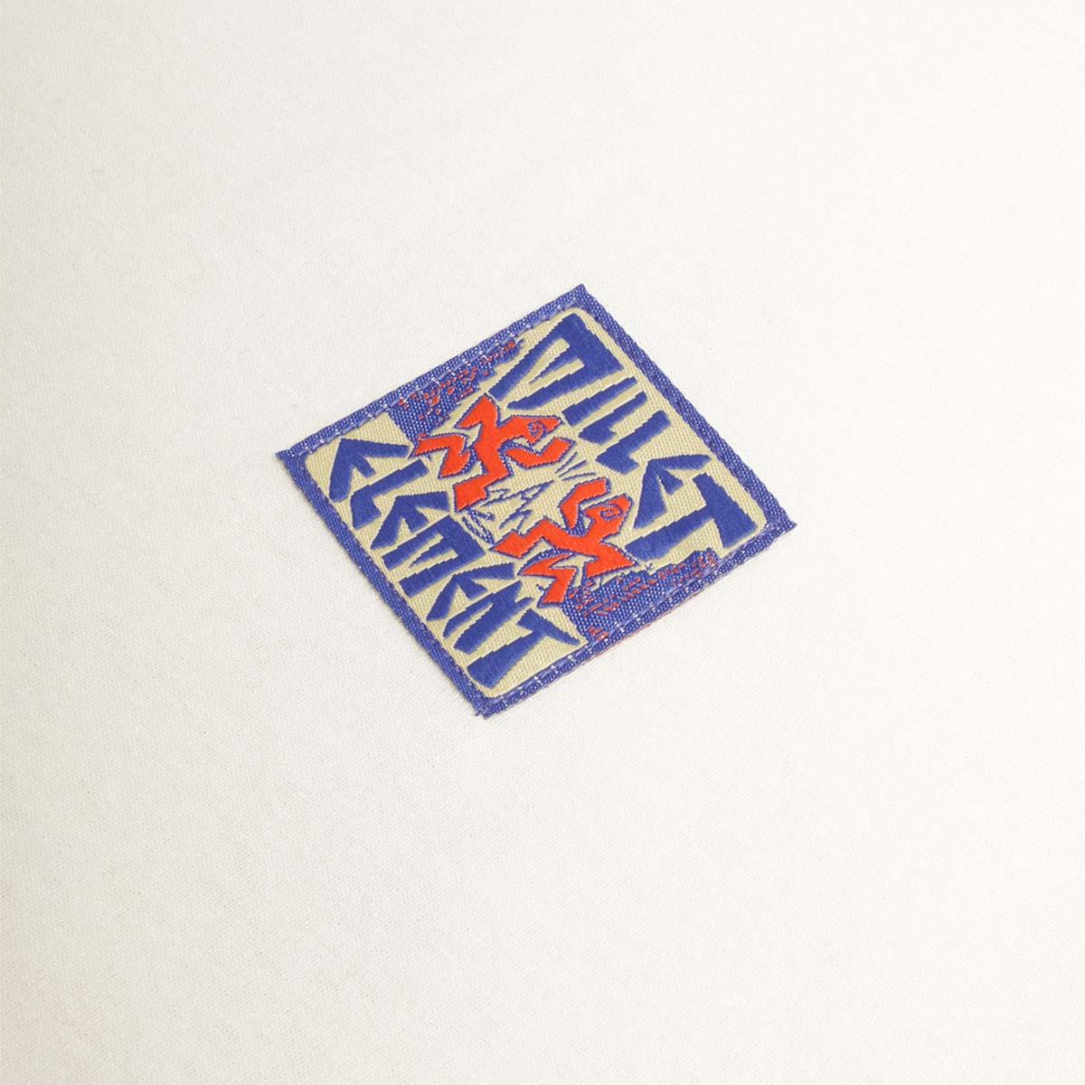 Blue square graphic on natural cotton chest