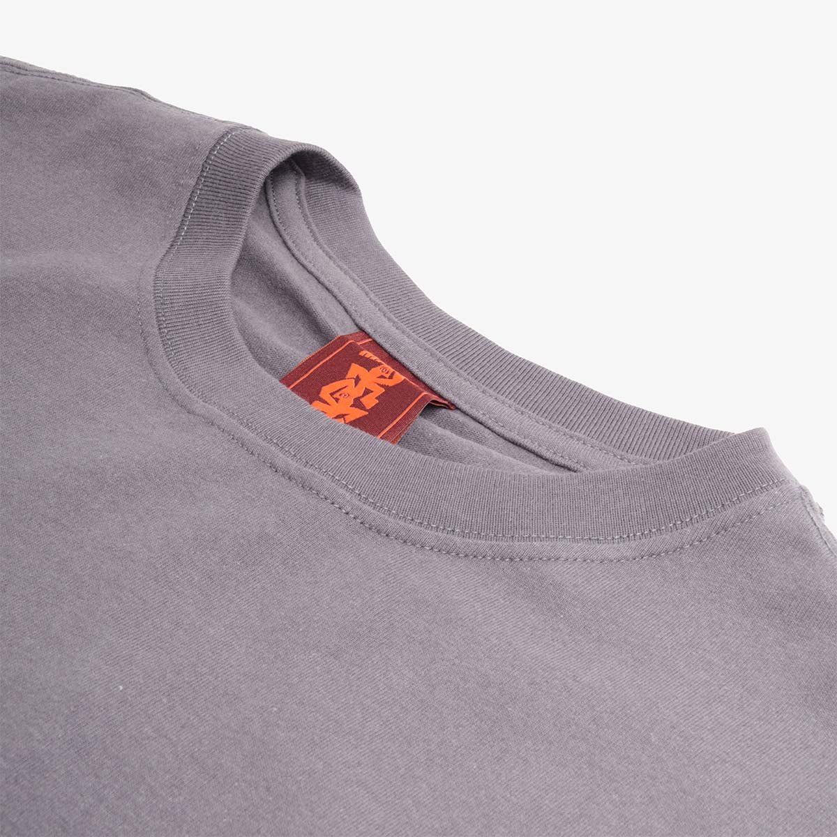 Collar and red woven neck label, charcoal long sleeve tee
