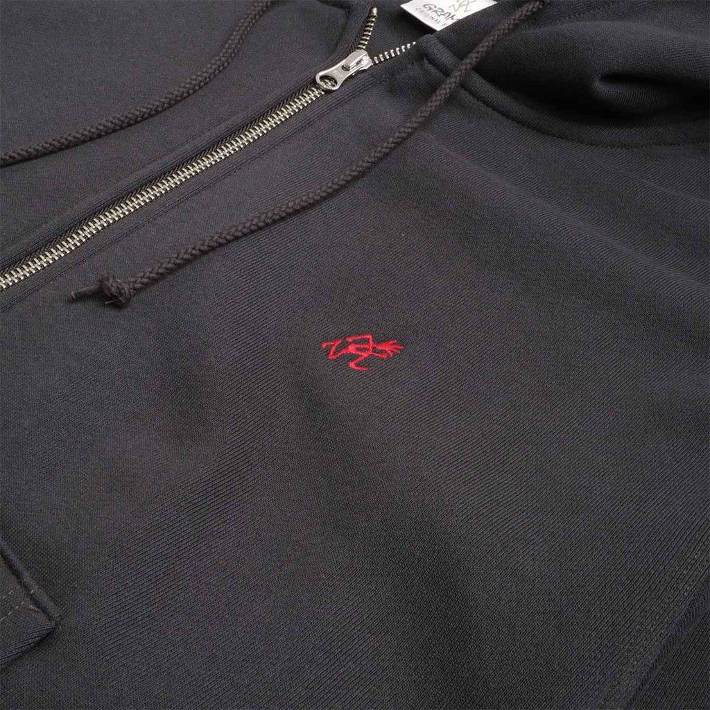 Red Gramicci script logo on vintage black zip hoodie chest