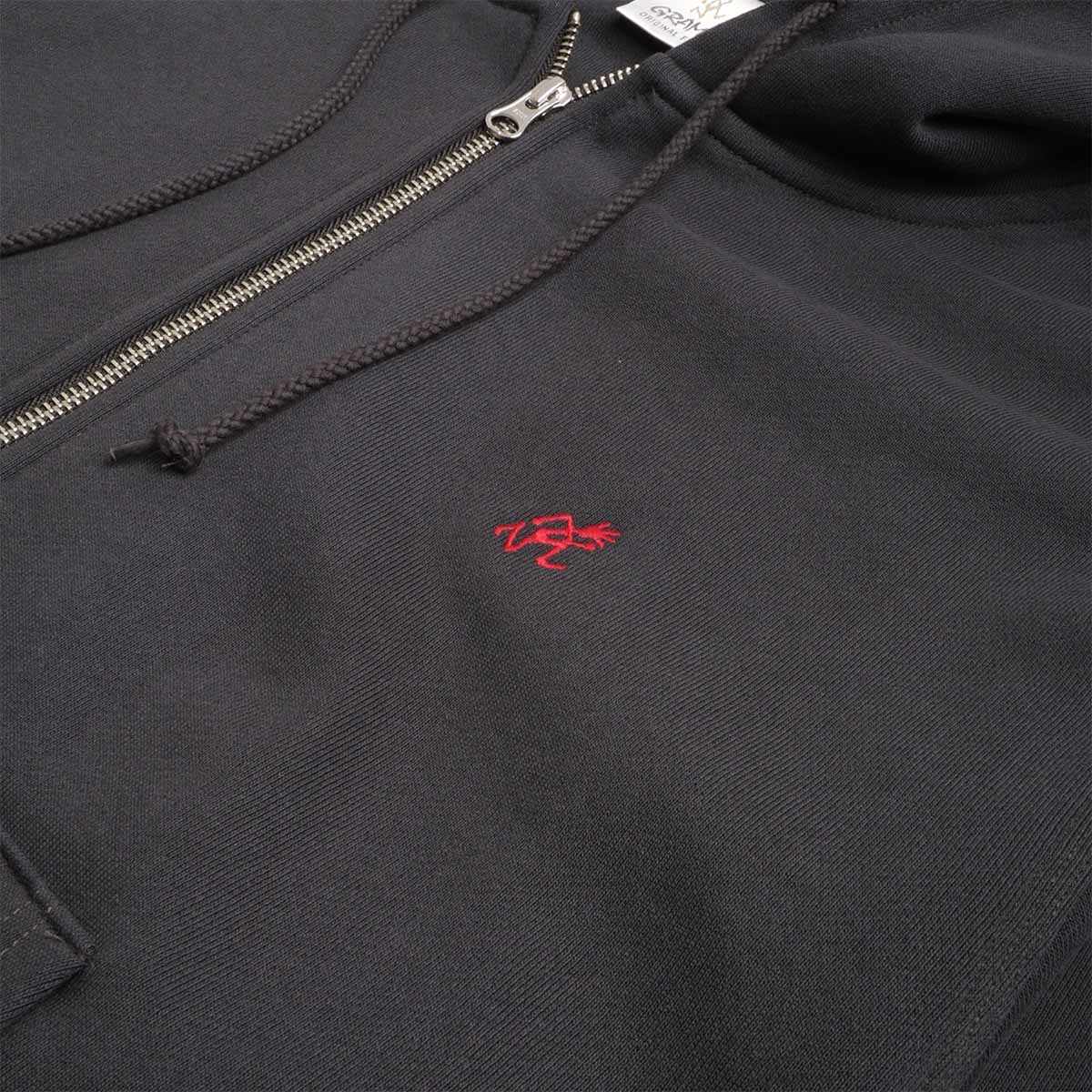 Red Gramicci script logo on vintage black zip hoodie chest