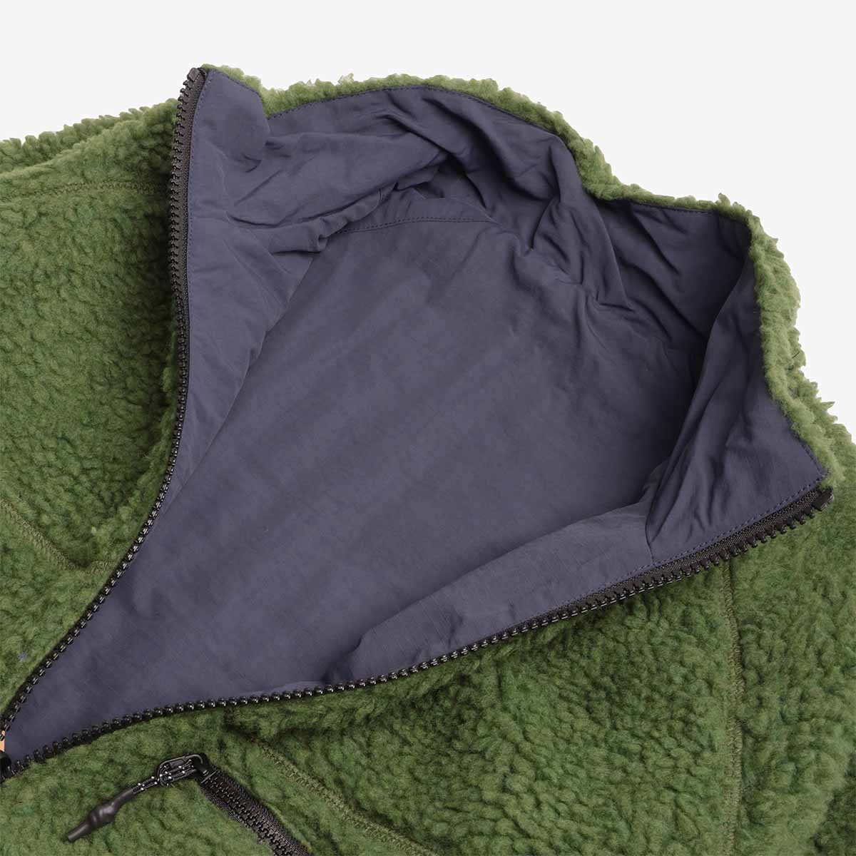 Collar showing navy reversible lining, Gramicci sherpa jacket