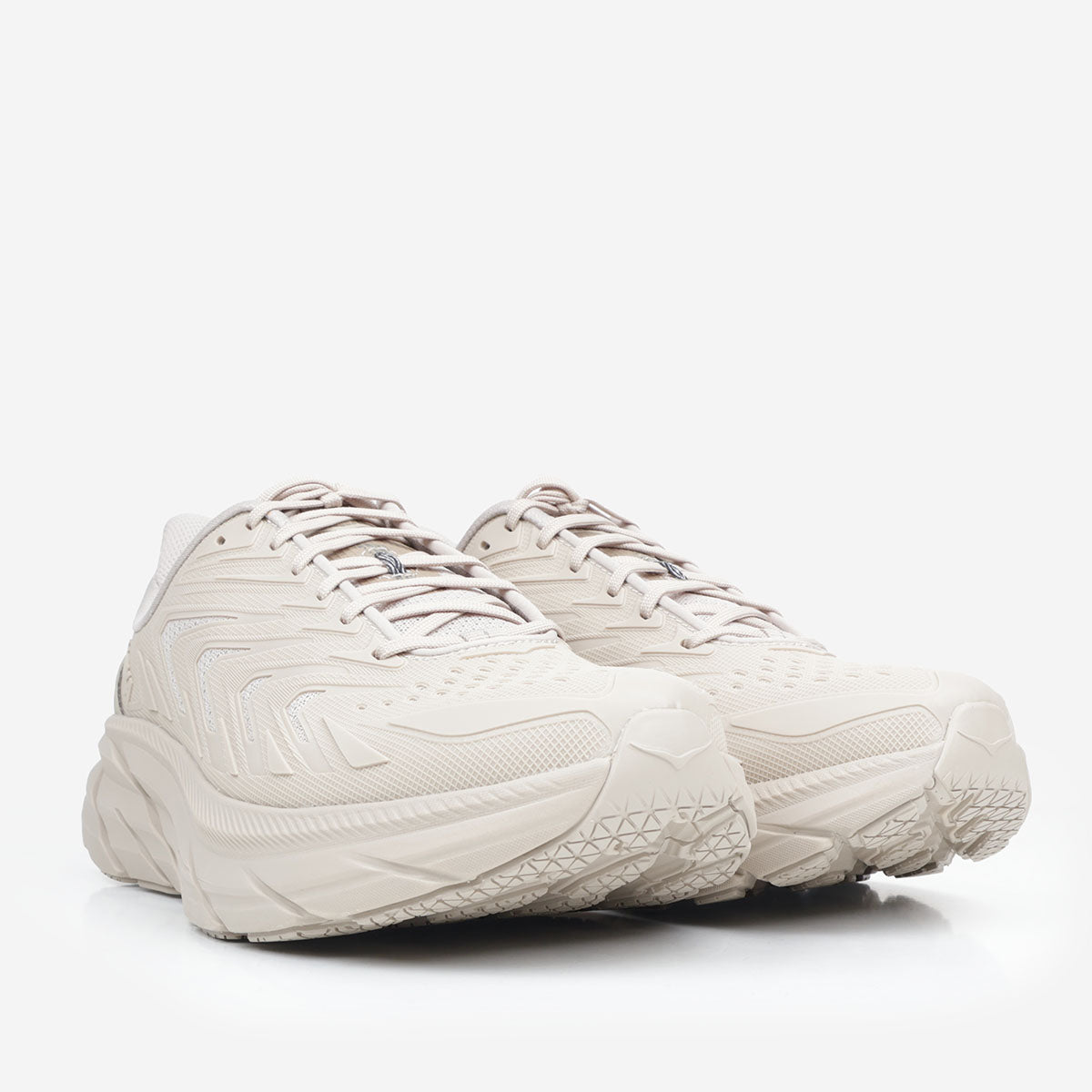 HOKA Clifton Utility shoes in Archival Taupe, front three-quarter view