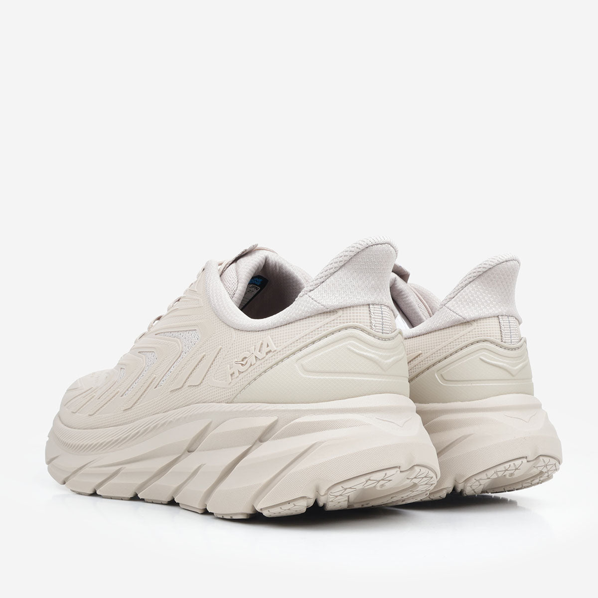 HOKA Clifton Utility shoes in Archival Taupe, heel and back view