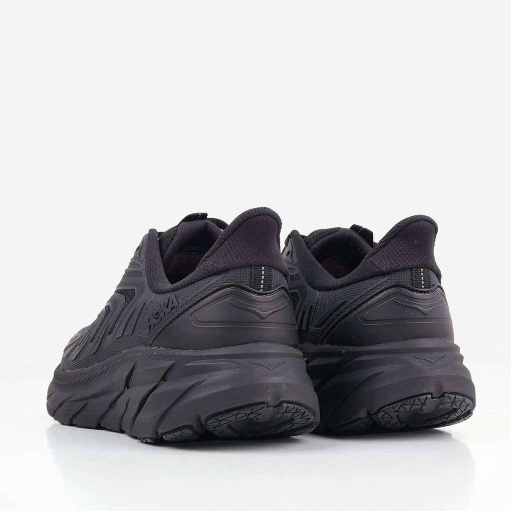 HOKA Clifton Utility Shoes in Black, back view