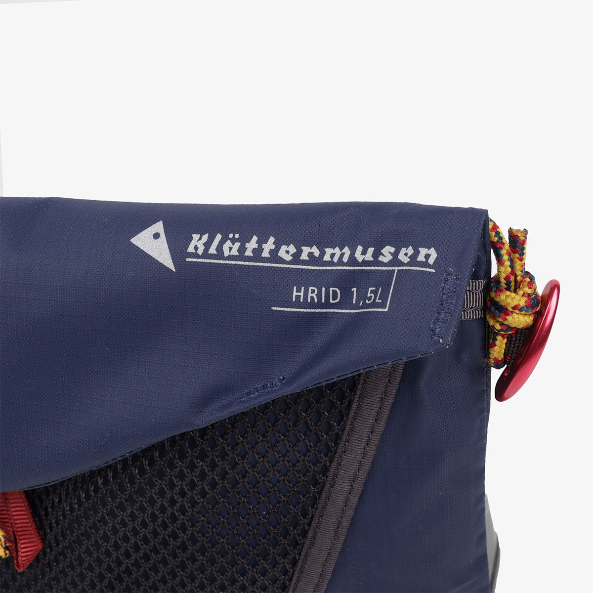 Klattermusen Hrid logo on navy crossbody bag