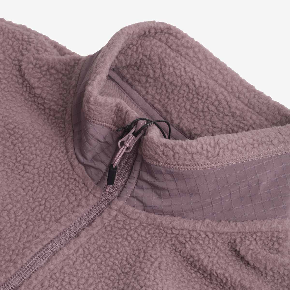 Zip pull and chest panel detail, plum expedition fleece