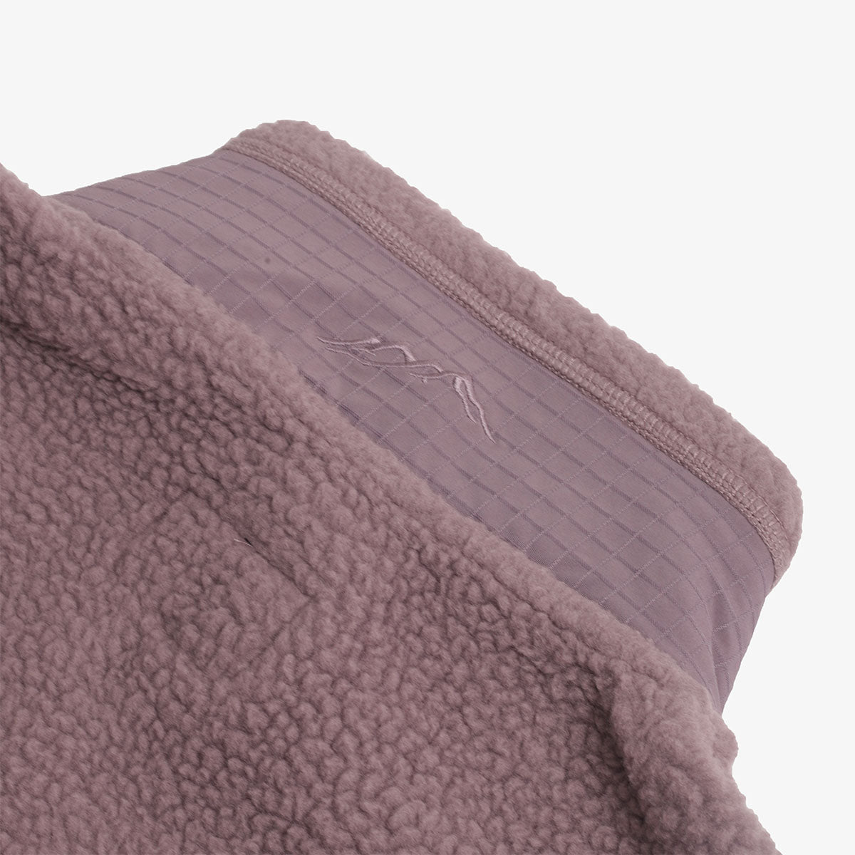 Ripstop back panel and tonal logo, plum fleece