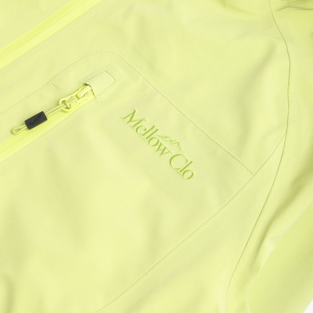 Chest pocket and Mellow Clo logo, lime Trek jacket