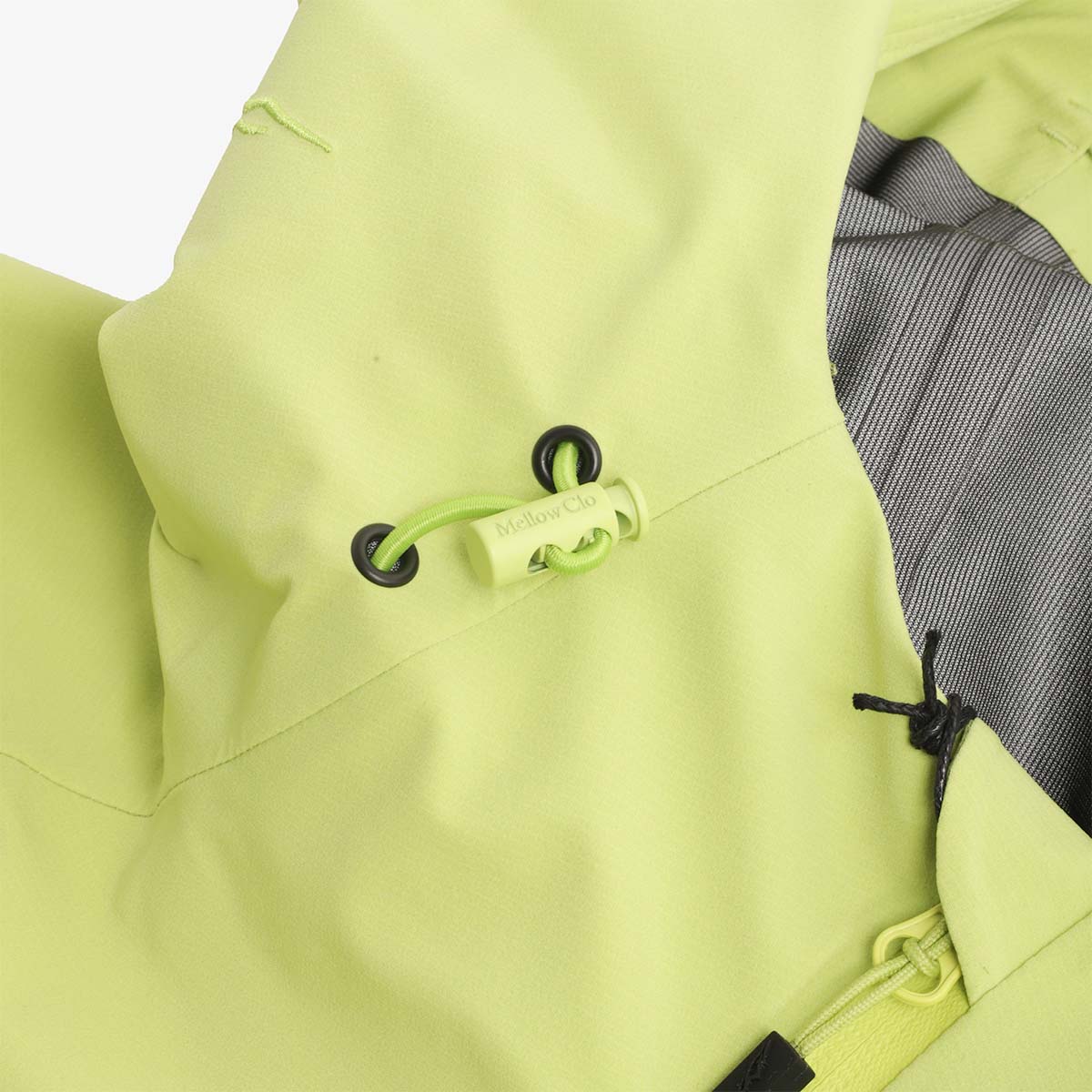 Hood drawcord and toggle detail, lime Trek jacket