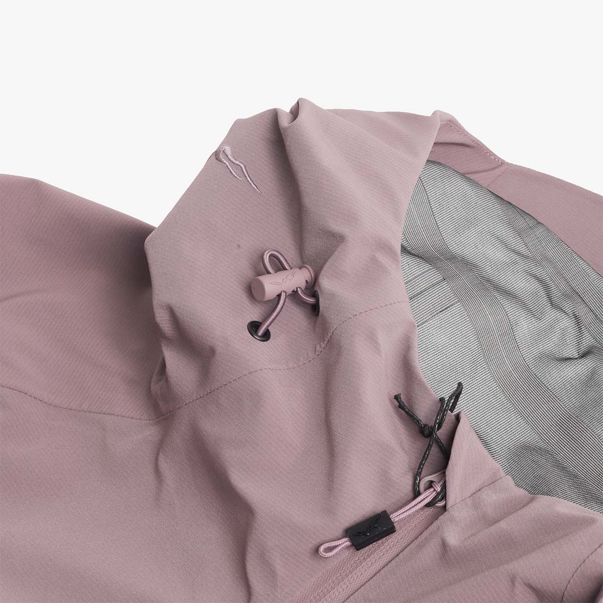Hood drawcord and toggle detail, plum Trek jacket