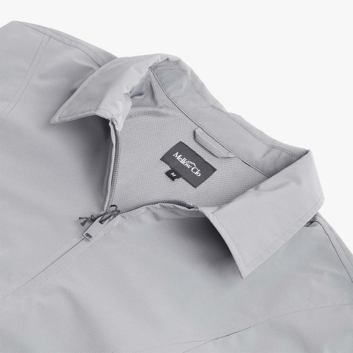 Collar zip and Mellow Clo label, grey Amble jacket