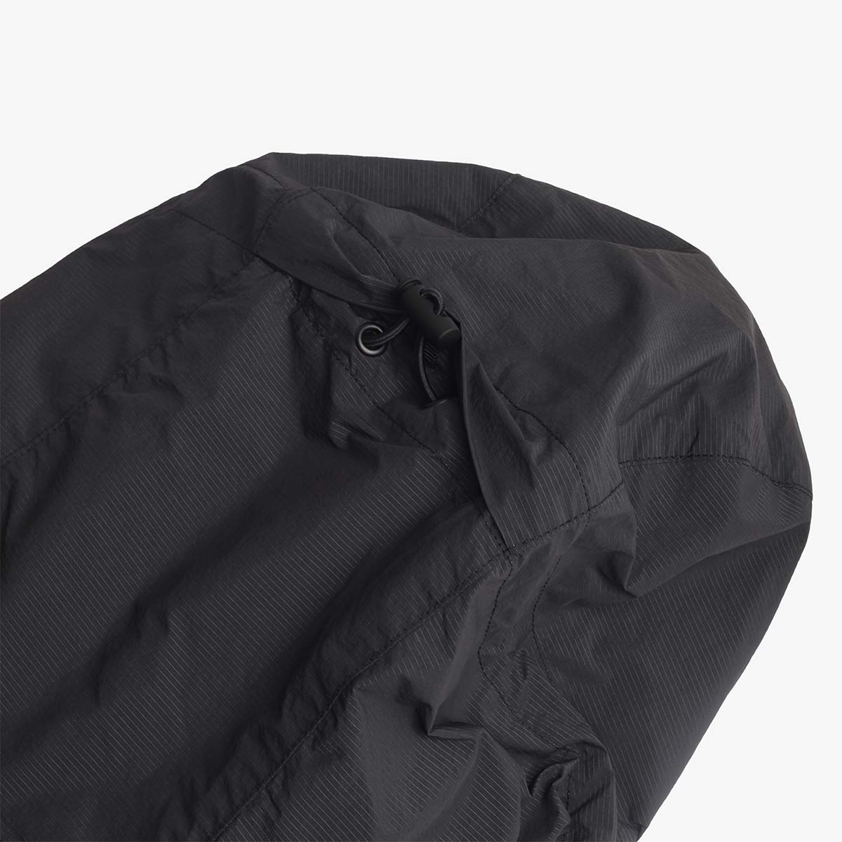 Hood and collar zip detail, black ripstop jacket