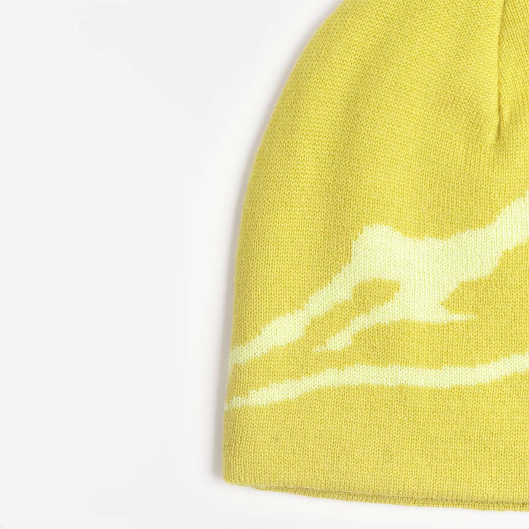 Lime merino beanie with knitted mountain design, angled view