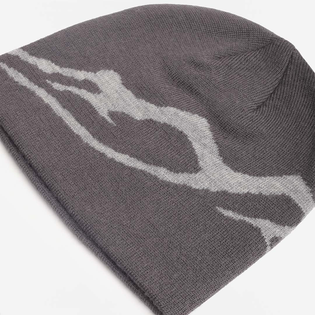 Knitted mountain motif across the grey merino beanie, top view