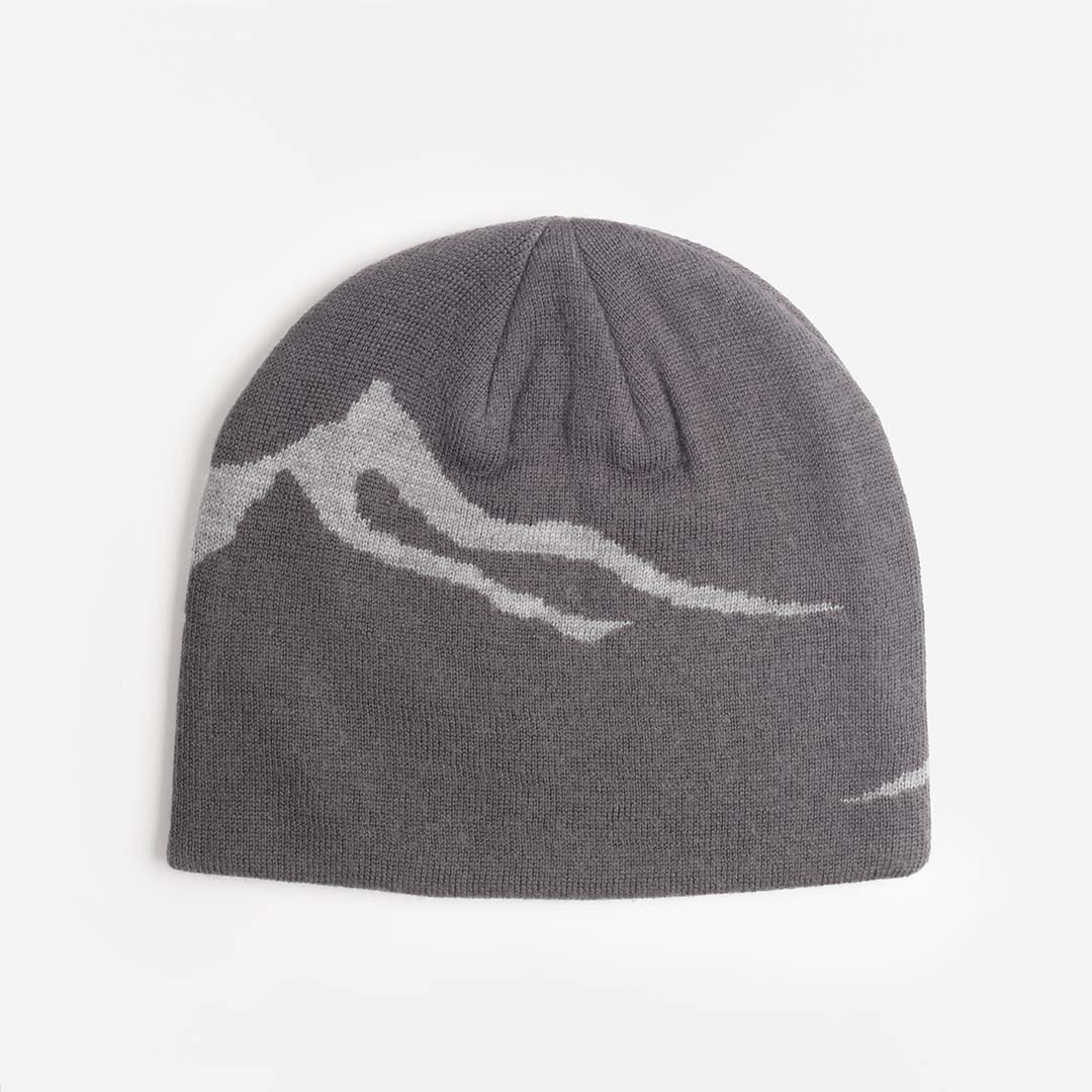 Grey merino beanie with knitted mountain design, side view