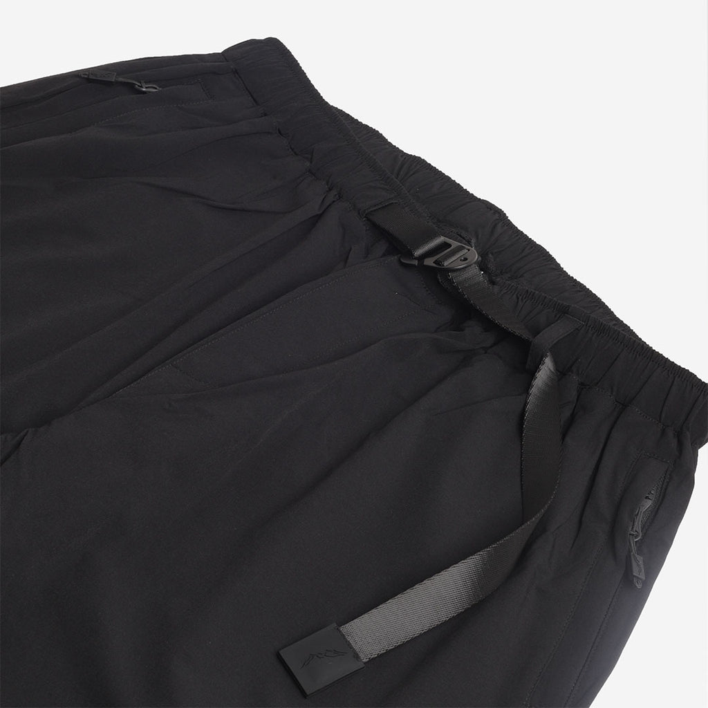 Side pocket and adjuster detail, black trousers
