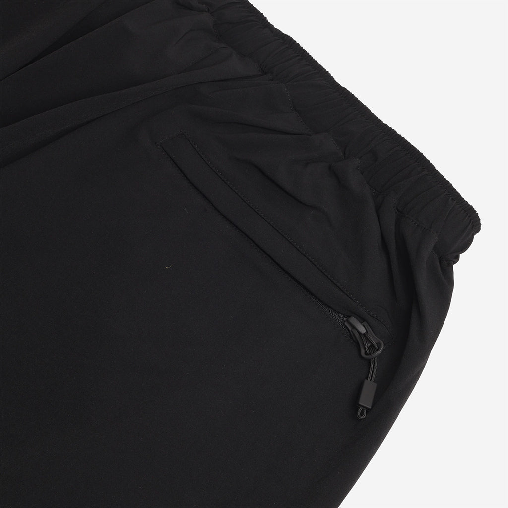 Zipped back pocket detail, black trousers