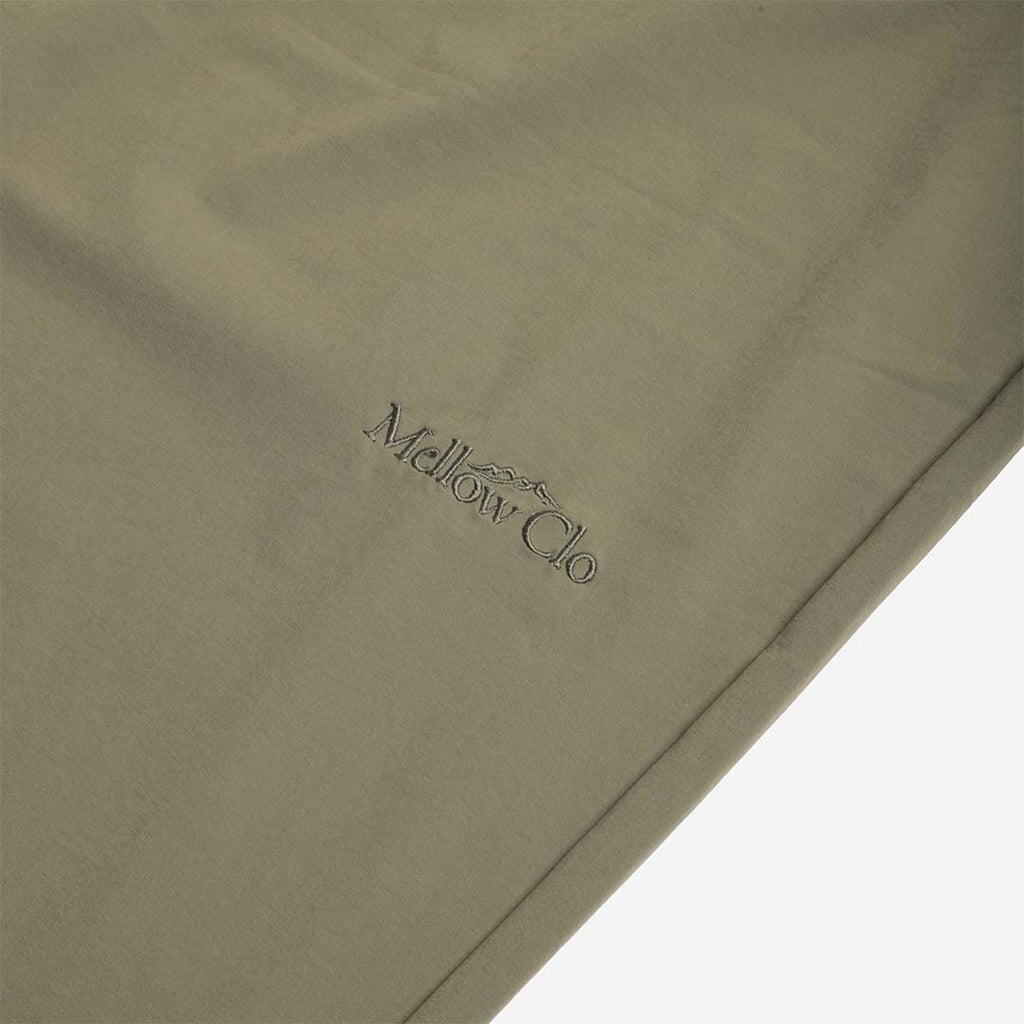 Tonal Mellow Clo logo on the olive trouser leg