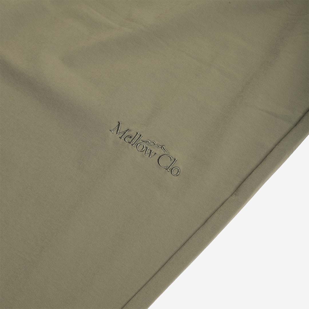 Tonal Mellow Clo logo on the olive trouser leg