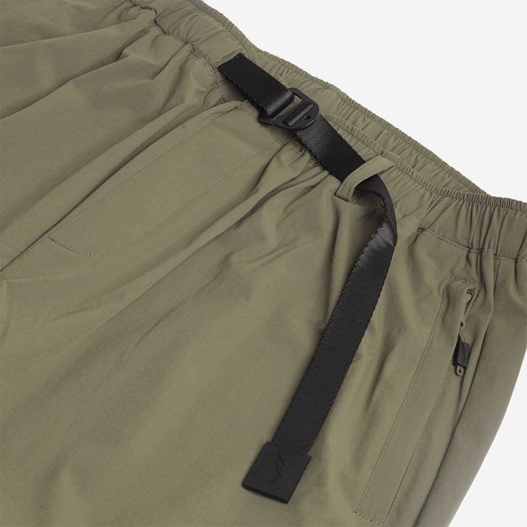 Webbing belt and side pocket detail, olive trousers
