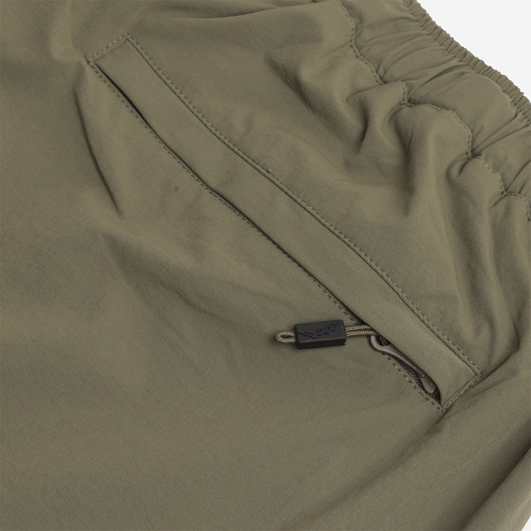 Zipped side pocket detail, olive trousers