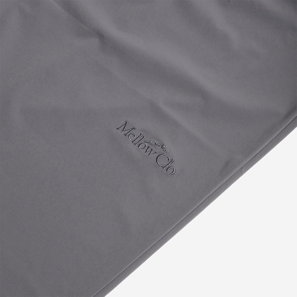 Tonal Mellow Clo logo on the grey trousers