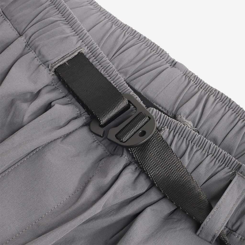 Elasticated waistband and webbing belt buckle, grey trousers