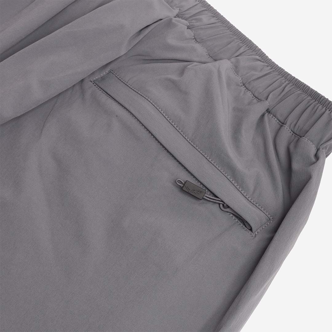 Zipped side pocket detail, grey trousers