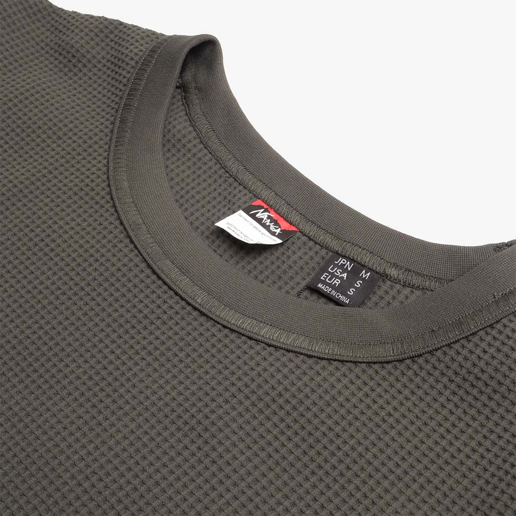 Crew neck with Nanga neck labels on olive waffle knit