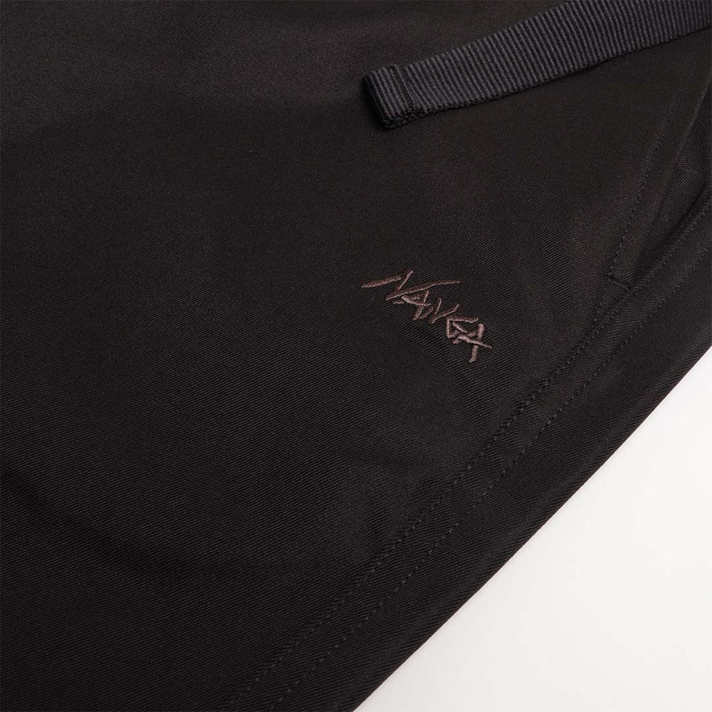 Embroidered Nanga logo and webbing belt on black chino