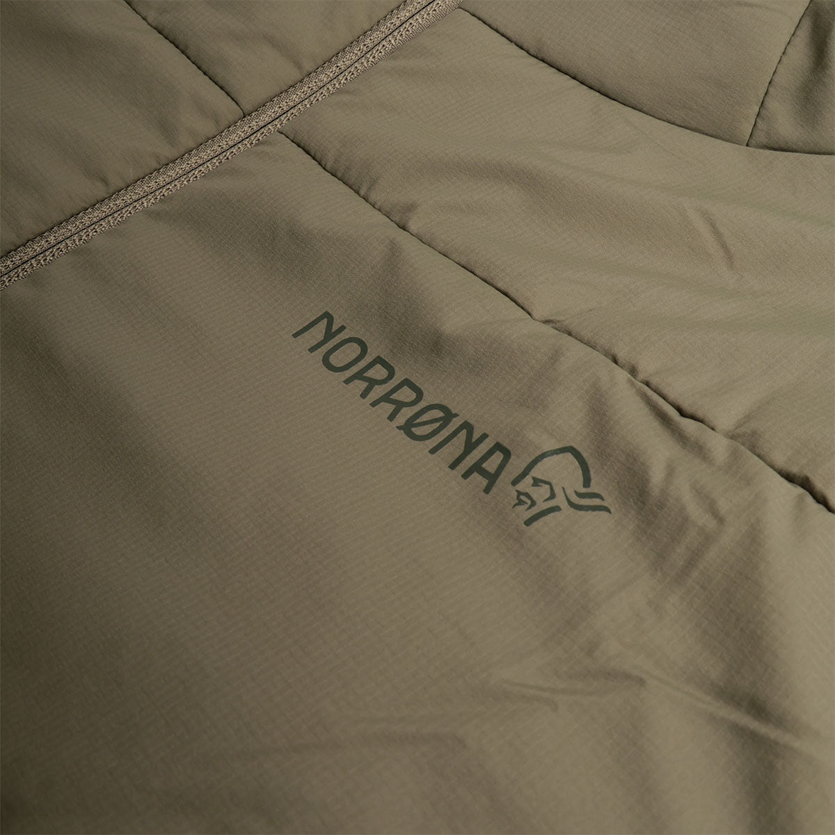 Norrona text logo on olive night insulated jacket