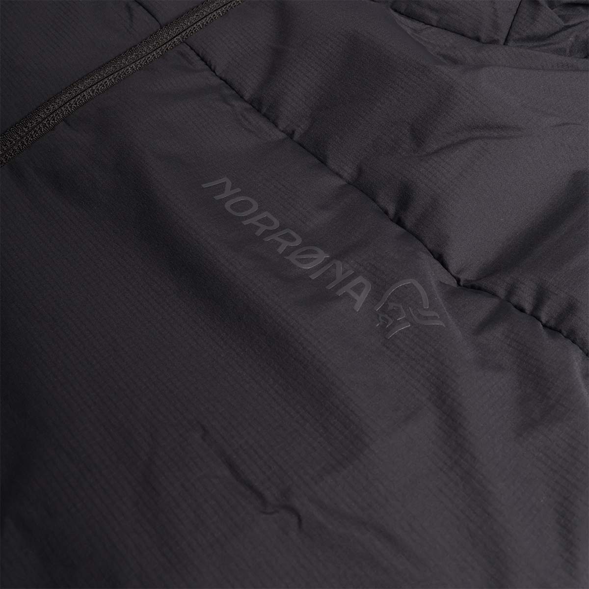 Norrona text logo on black Femund insulated jacket