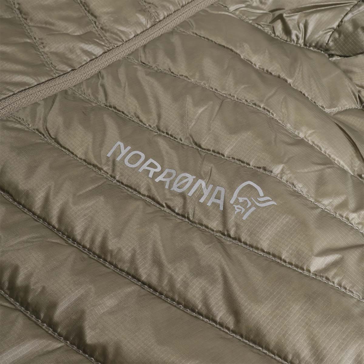 Norrona text logo on deep lichen green down jacket