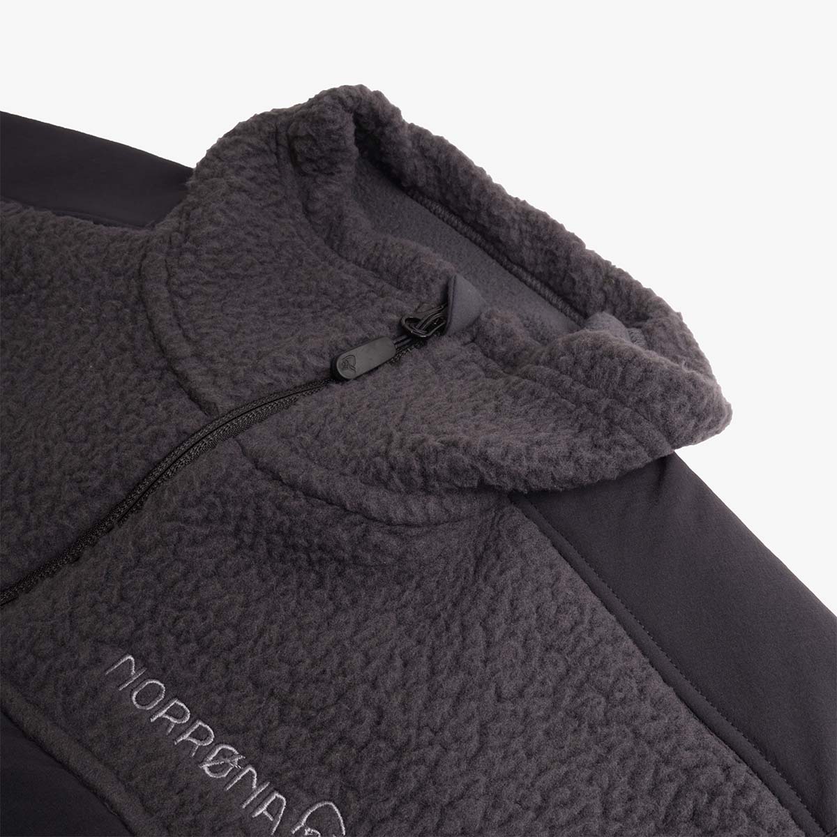 Collar and zip pocket detail on Norrona Warm3 fleece vest