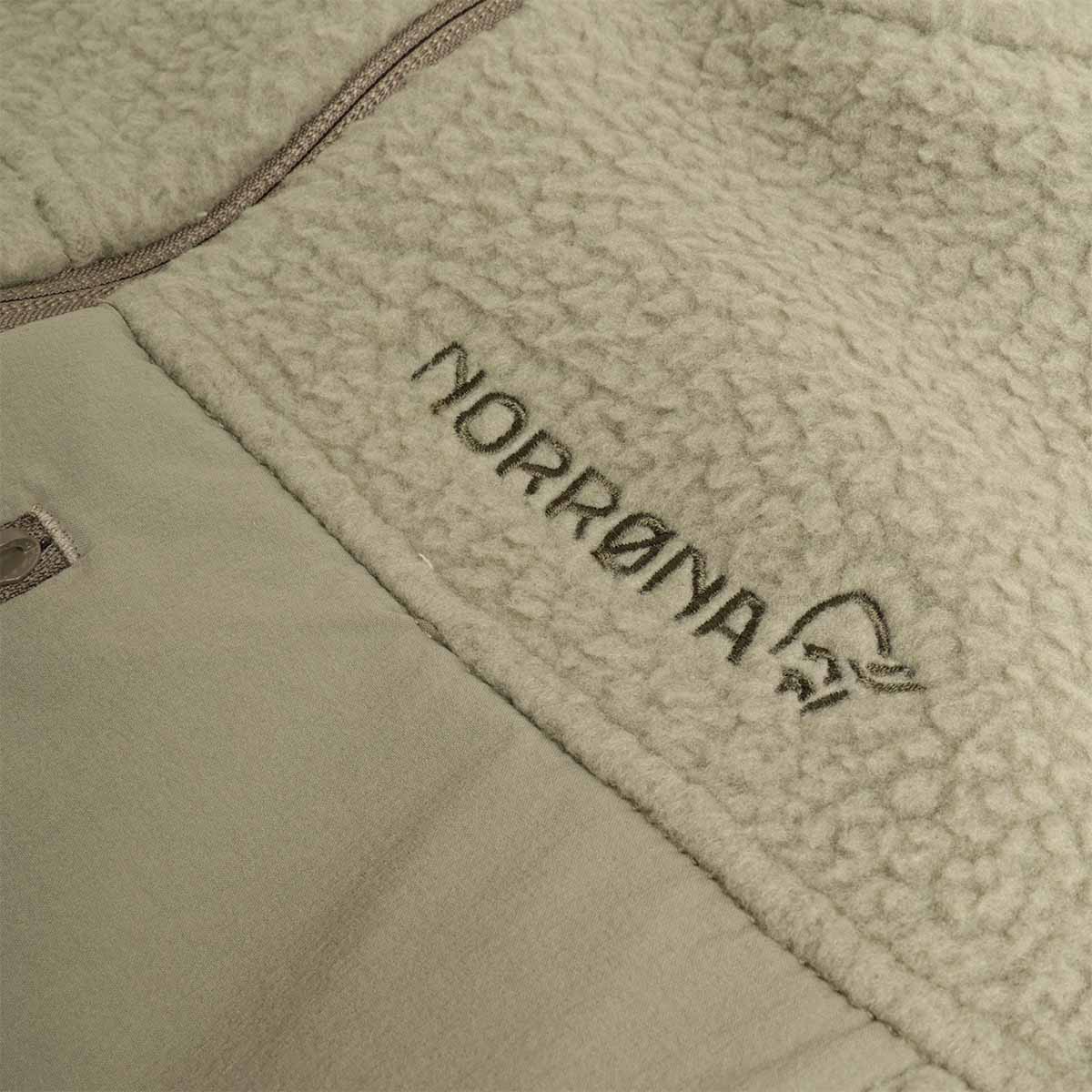 Norrona text logo on deep lichen green fleece jacket
