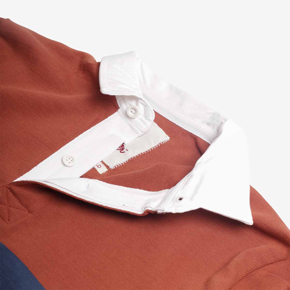 Woven Opensider collar label on clay cotton with chest stripe